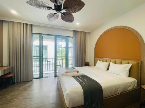 Кровать или кровати в номере Elyday Villa - Bai Khem Beach, Phu Quoc