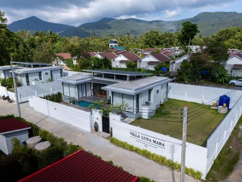 an aerial view of a residential neighbourhood with houses at Villa Luna Mara in Koh Phangan