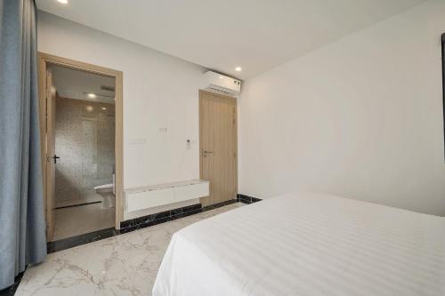 Кровать или кровати в номере Elyday Villa - Bai Khem Beach, Phu Quoc