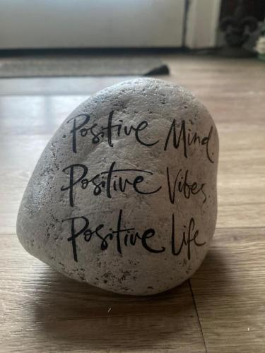 a rock with writing written on it on the floor at Blue Spruce Bed and Breakfast Muskoka in Gravenhurst
