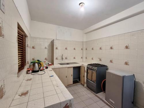 Kuchyň nebo kuchyňský kout v ubytování Departamento central Lin
