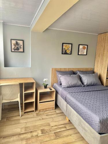 Postel nebo postele na pokoji v ubytování Hostelfc Santa Barbara