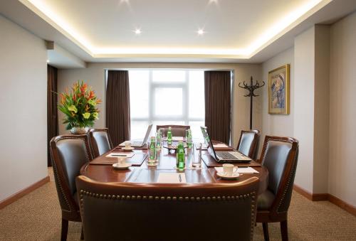 a conference room with a long table and chairs at Swissotel Lima in Lima