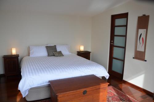 Postel nebo postele na pokoji v ubytování Yolla Beach House