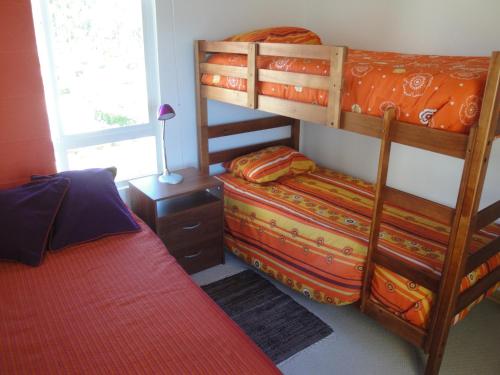 Säng eller sängar i ett rum på Costa Quilen Vista al Mar
