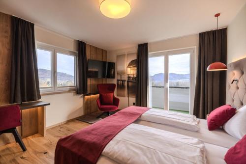 Postel nebo postele na pokoji v ubytování Hotel Haberl - Attersee