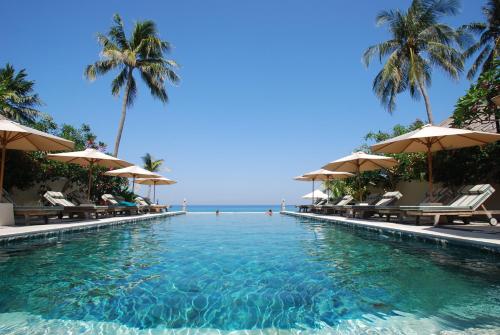 Poolen vid eller i närheten av Puri Mas Boutique Resort & Spa