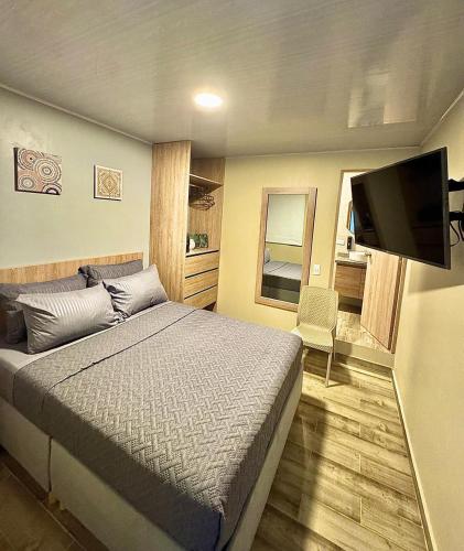 Postel nebo postele na pokoji v ubytování Hostelfc Santa Barbara