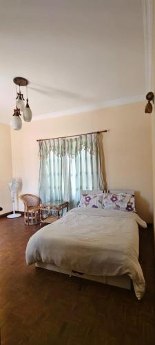 Letto o letti in una camera di Heritage View Homestay