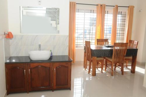 Imagem da galeria de Holidayincoorg Orchid Villa em Madikeri