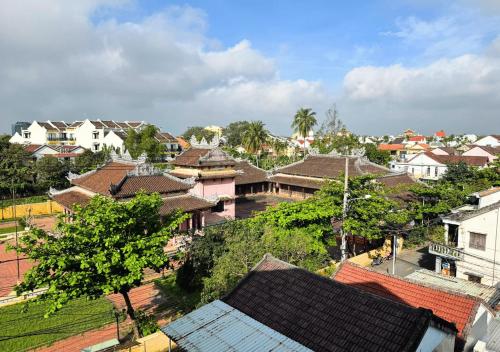 an overhead view of a village with houses and trees at Yzistel Hoi An in Hoi An