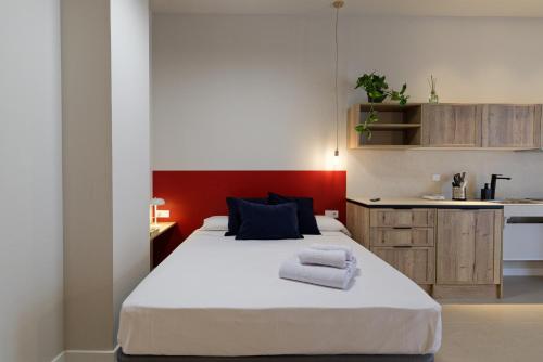 Ein Bett oder Betten in einem Zimmer der Unterkunft Osito Hub - Colomer