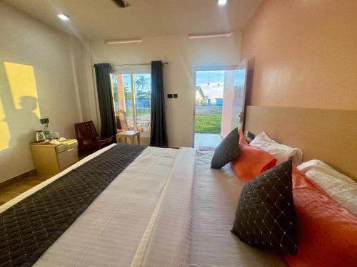 Fotografie z fotogalerie ubytování Beach House Varkala by Palmyra v destinaci Varkala