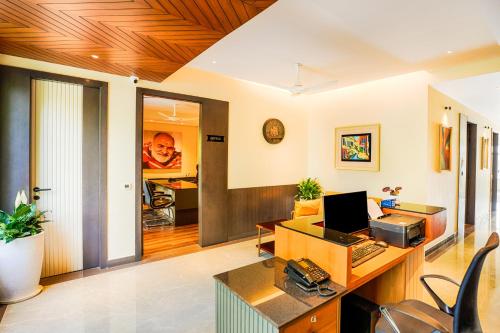 an office with a desk with a computer on it at Hotel Treeline in Haldwāni
