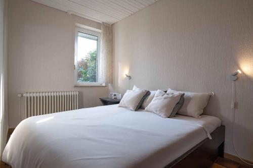 Ένα ή περισσότερα κρεβάτια σε δωμάτιο στο Ferienhaus Klaus