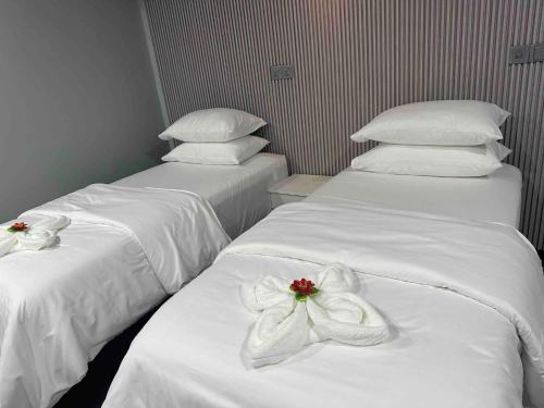 Postel nebo postele na pokoji v ubytování Jazz guest house