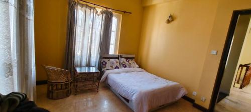 Letto o letti in una camera di Heritage View Homestay