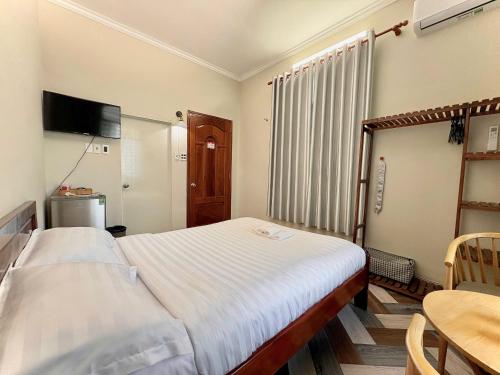 Кровать или кровати в номере RUSTIC APARTMENT- BeTong Residences