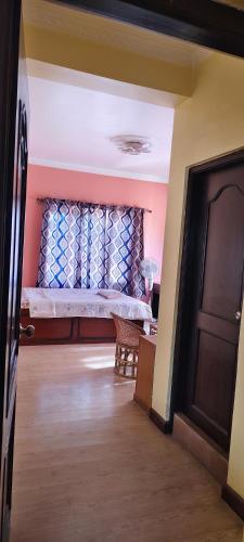 Letto o letti in una camera di Heritage View Homestay