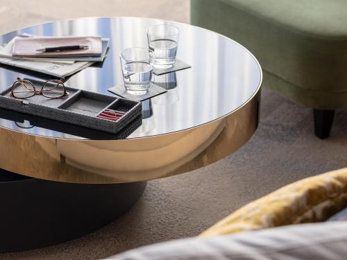 a coffee table with glasses and a tray on it at Mitsui Garden Hotel Nagoya Premier in Nagoya