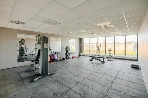 Pusat kecergasan dan/atau kemudahan kecergasan di Apartment Oskar - Basen & SPA - Dziwnów