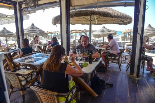 Επισκέπτες που μένουν στο Residence sul mare all'interno del parco naturale con piscina