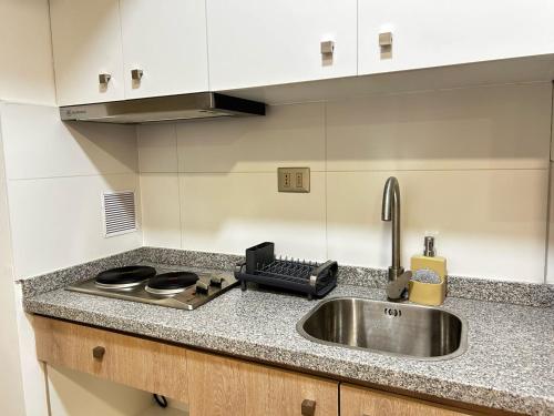 Kuchyň nebo kuchyňský kout v ubytování Modern studio in Concepción