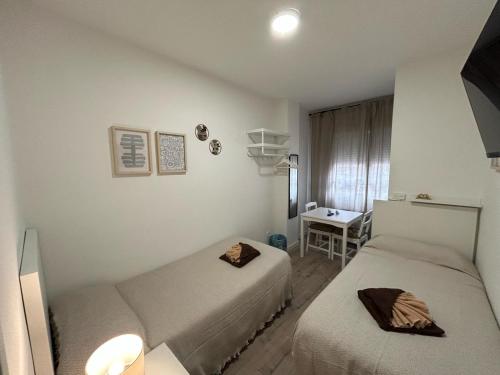 Habitaciones en Embajadores