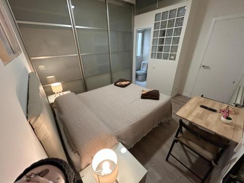 Postel nebo postele na pokoji v ubytování Habitaciones en Embajadores