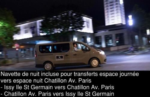 a small van driving down a street at night at Issy Citea Access dayuse Room - Work and Day Rest Timeshare -- 2 min tram - Formule Temps Partagé -- Navette ile d'Issy Avenue Paris 92320 espace nuit in Issy-les-Moulineaux