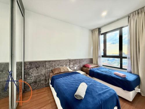 Katil atau katil-katil dalam bilik di i-City Shah Alam Residences by ASDEH Suites