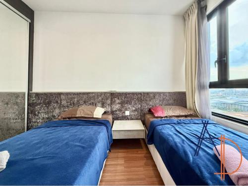 Katil atau katil-katil dalam bilik di i-City Shah Alam Residences by ASDEH Suites