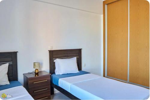 Ένα ή περισσότερα κρεβάτια σε δωμάτιο στο Apartamentos Ramos 3