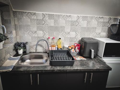 Küche/Küchenzeile in der Unterkunft Várhegy apartman