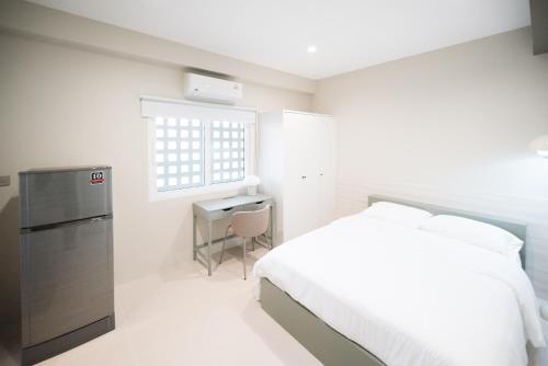 Cuisine ou kitchenette dans l'établissement Slee สลี