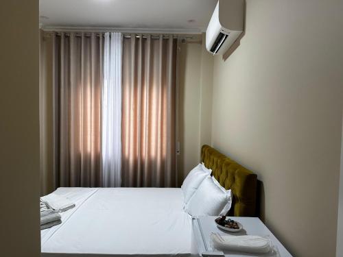 Una cama o camas en una habitación de Hotel Erta