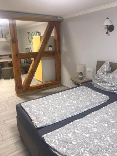 Ένα ή περισσότερα κρεβάτια σε δωμάτιο στο Spreewald-Ferienwohnung Reschke/Jahn