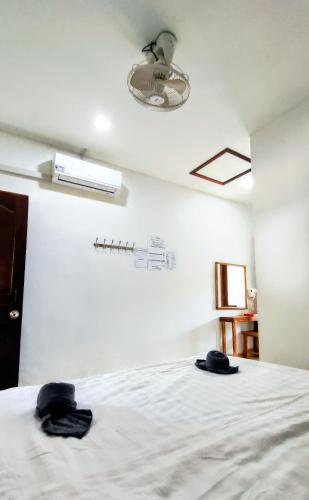 Ένα ή περισσότερα κρεβάτια σε δωμάτιο στο Meexok guesthouse