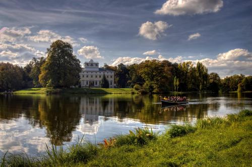 a group of people in a boat on a lake at Ferienunterkünfte Familie Berger in Dessau