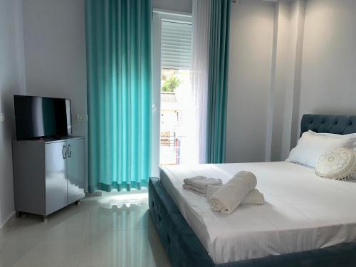 Una cama o camas en una habitación de Hotel Erta