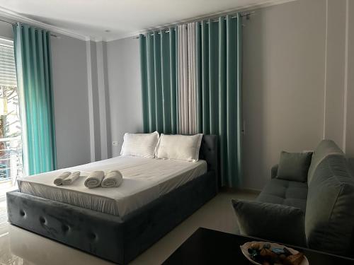 Una cama o camas en una habitación de Hotel Erta
