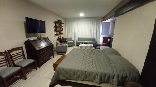 En eller flere senge i et værelse på DEVOTO Studio Center