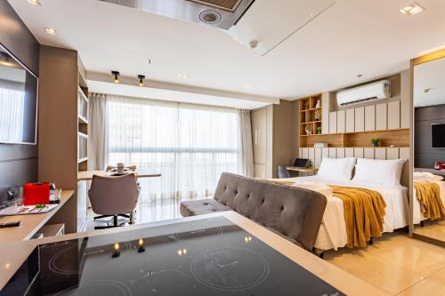 Ένα ή περισσότερα κρεβάτια σε δωμάτιο στο Belíssimo Apartamento DF PLAZA 1º Andar
