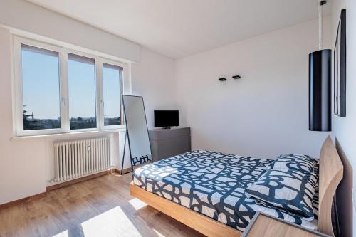 Кровать или кровати в номере Appartamento tra Milano, Bergamo e Brescia