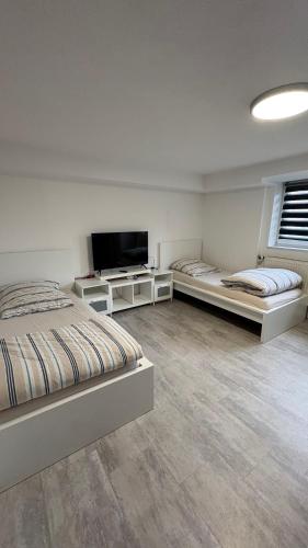 Postel nebo postele na pokoji v ubytování Monteurzimmer Ringingen