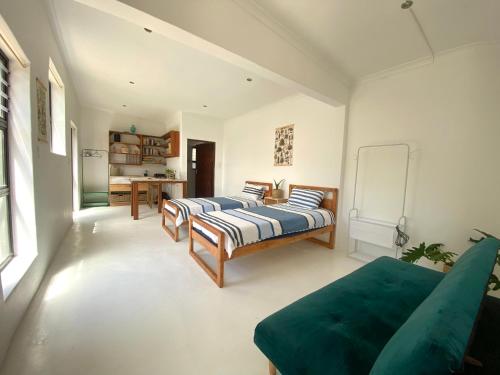 Postel nebo postele na pokoji v ubytování Wildlife Paradise Beach House