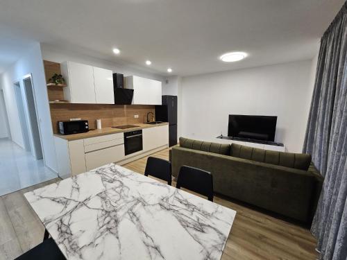 Kuchyň nebo kuchyňský kout v ubytování Apartman Rafaella