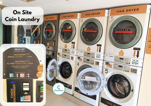 a group of four washing machines in a store at Sunway Studio HomeStay Access Mall & next to Lagoon by Cloud Host in Petaling Jaya