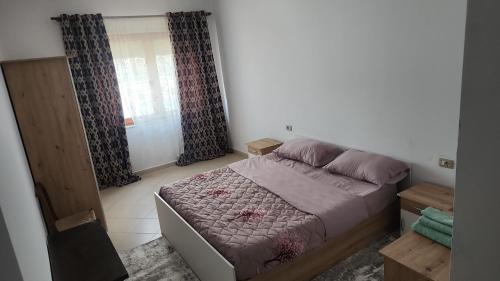 Postel nebo postele na pokoji v ubytování A-Tirana Apartment Bus Terminal