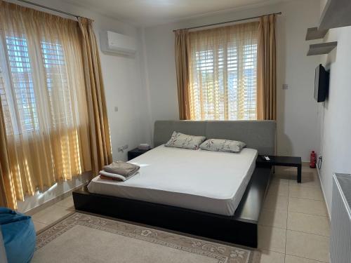 Ένα ή περισσότερα κρεβάτια σε δωμάτιο στο Villa Andy-350 m from the beach